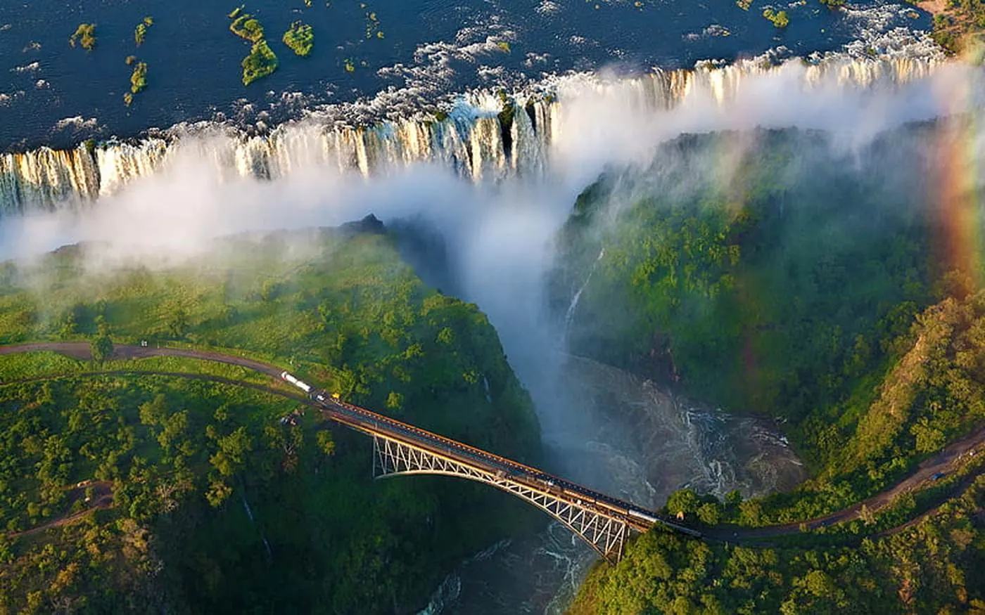 Aerial view of Victoria Falls, the Zambezi and the Victoria Falls Bridge