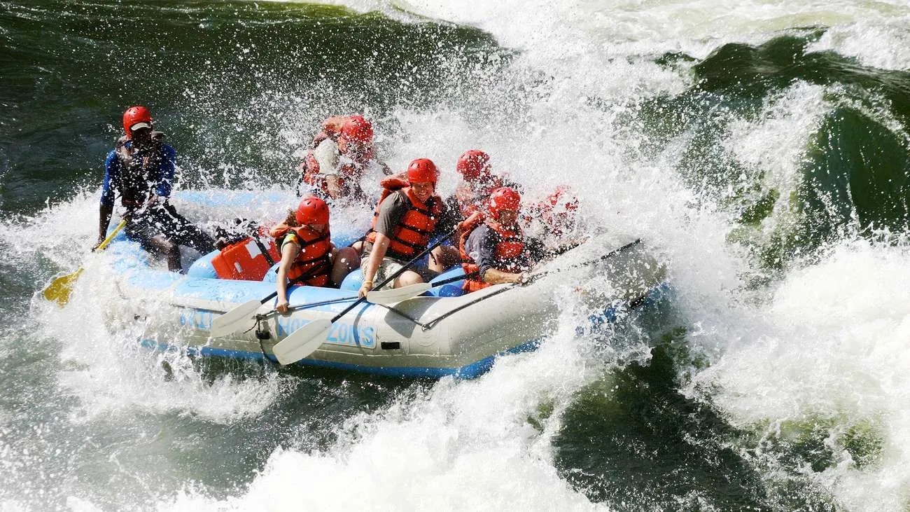 White water raft crashing through Batoka Gorge rapids on the Zambezi